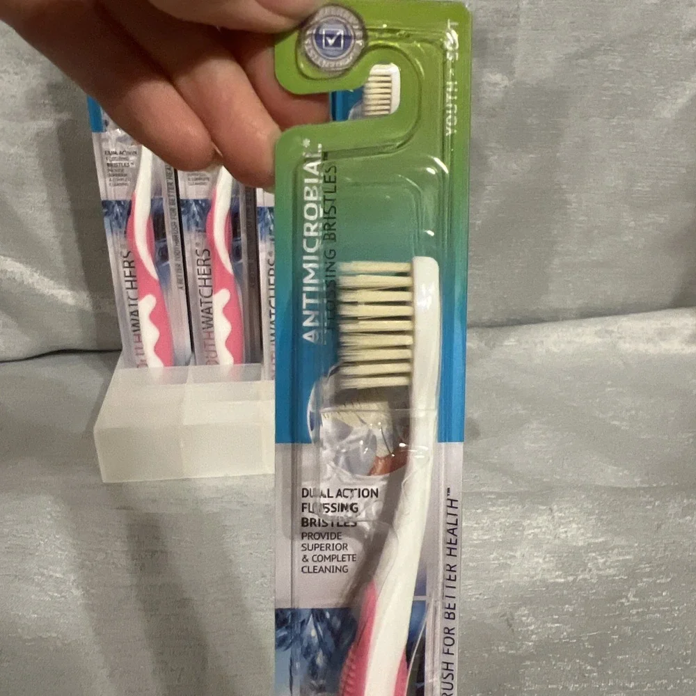 Doctor Plotkas Mouth Watchers Antimicrobial Soft Bristle youth Toothbrush pink